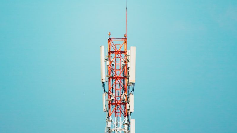 a tall tower with lots of antennas on top of it