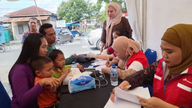 pertamina-buka-posko-kesehatan-pasca-banjir-di-depan-fuel-terminal-medan
