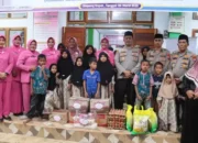 Kapolres Pasbar Berbagi, Anak Yatim Tersenyum di Ramadan