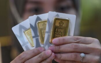 Harga Emas Antam Terkoreksi, Pasar Global Bergerak Beragam