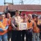 polres-dharmasraya-salurkan-paket-sembako-bagi-komunitas-ojek