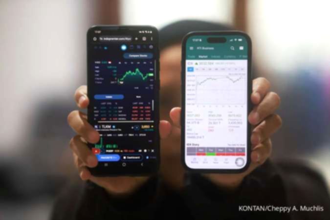 Tampilan grafik pergerakan Indeks Harga Saham Gabungan di layar monitor bursa efek