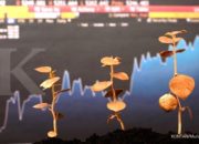 Tampilan antarmuka aplikasi trading saham di ponsel pintar dengan grafik pergerakan harga saham perusahaan teknologi dunia