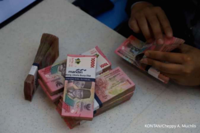 Grafik pergerakan nilai tukar rupiah terhadap dolar AS di layar monitor