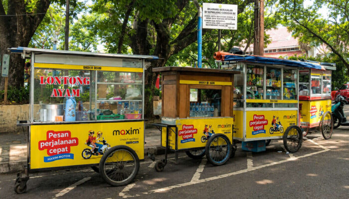 Maxim Tingkatkan Standar Kebersihan UMKM Pasar di Sumatera Barat