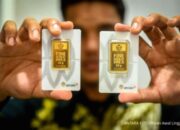 Logo PT BRI Manajemen Investasi dan ilustrasi emas batangan terkait peluncuran produk reksa dana ETF XDES.