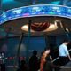Logo Bursa Efek Indonesia di gedung bursa dengan suasana area perkantoran Jakarta